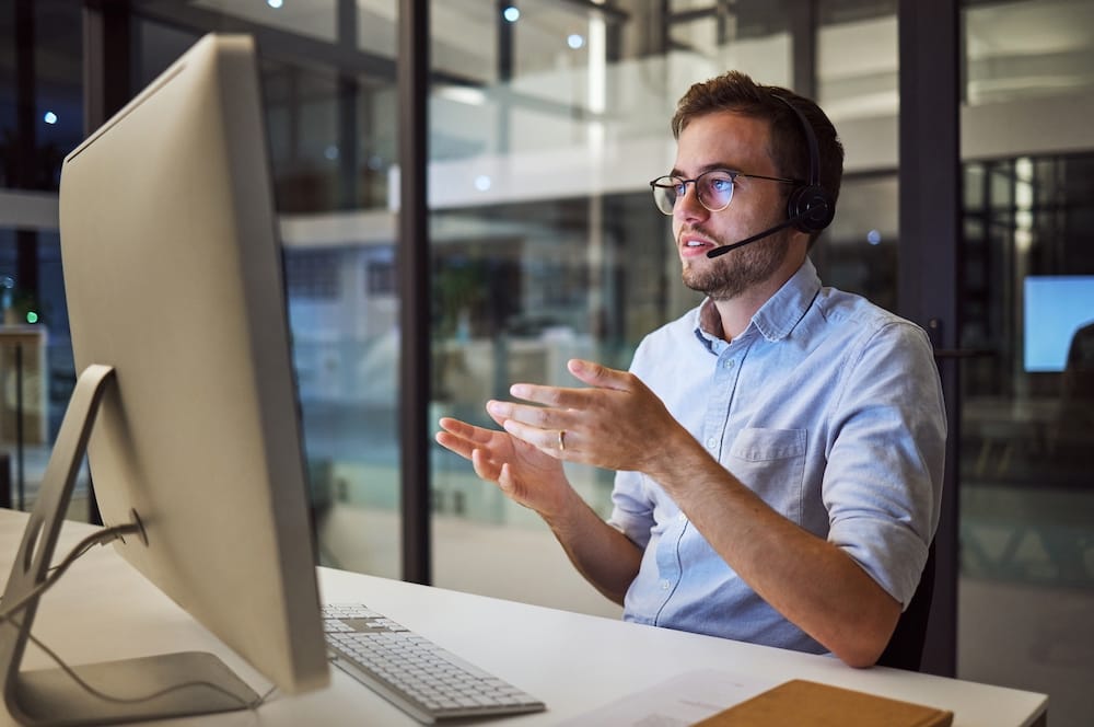 Man wearing a headset | Increase CRM adoption